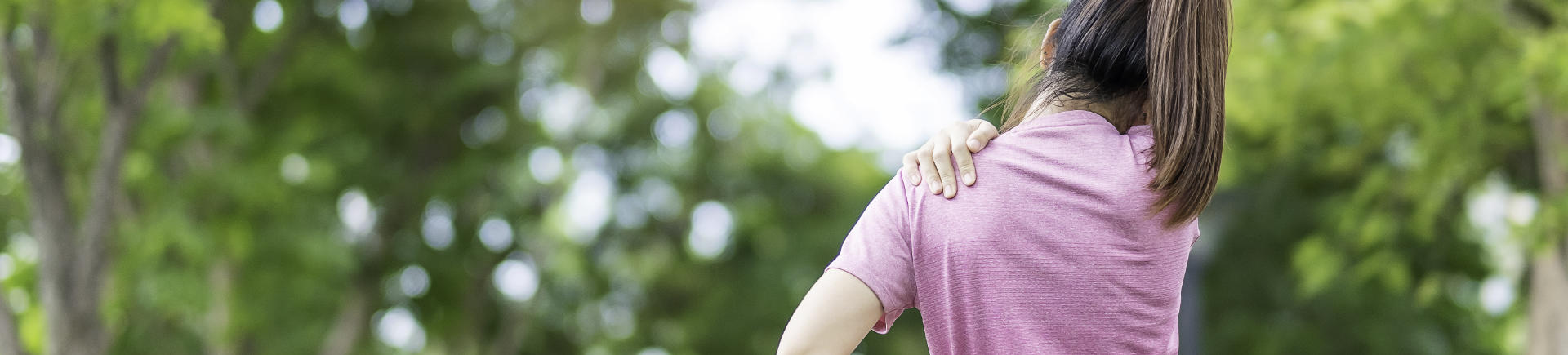 young woman with shoulder pain