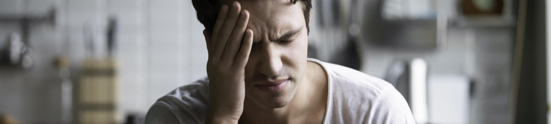 young woman suffering from headache